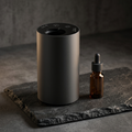 Siweiyi mini Type-C silent diffuser, photorealistic dark-premium packshot