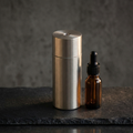 V-Rising 2-in-1 aluminum cordless diffuser, photorealistic dark-premium packshot